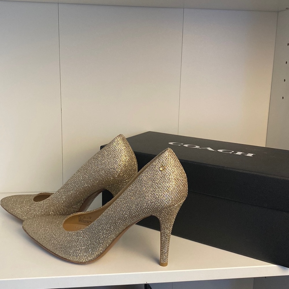 New in box gold Coach pumps 7.5
